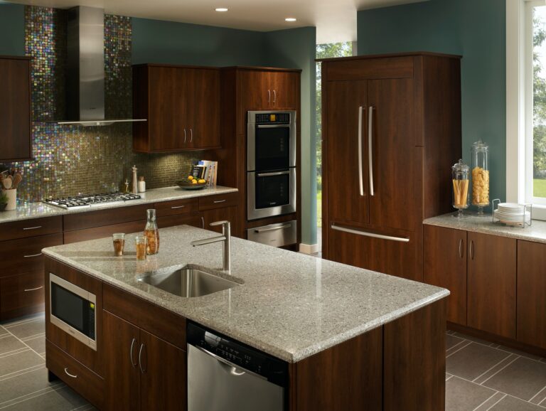 Dark wood kitchen with Silestone® quartz worktop in Alpina White