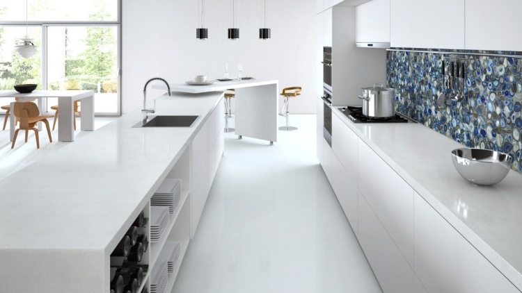 Contemporary kitchen with grey cabinets and Caesarstone® worktops in Georgian Bluffs